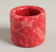 A CHINESE HARDSTONE ARCHERS RING.