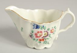 AN 18TH CENTURY WORCESTER LOW CHELSEA EWER with acanthus moulded base, painted with polychrome