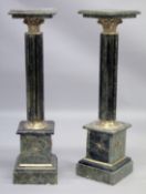 A PAIR OF MARBLE COLUMNS with square top.