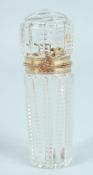 A GOOD CRYSTAL, GOLD MOUNTED, SCENT BOTTLE 3.25ins long.