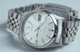 A ROLEX OYSTER DATE WRISTWATCH in a box. NO. 5018.