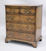 A GOOD 18TH CENTURY STYLE WALNUT CHEST OF DRAWERS with a moulded top, brushing slide, two short