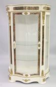 A FRENCH STYLE WHITE PAINTED STANDING DISPLAY CABINET of 'Serpentine outline inset with 