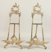 A PAIR OF BRASS EASELS 20ins high.