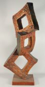 A LARGE ABSTRACT BRONZE OF THREE SQUARES on a square base. 4ft 6ins high.