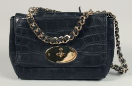 A MULBERRY BLACK CROCODILE SKIN. with long gilt handles. 9ins x 6ins.