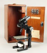 A DOUBLE BLACK PAINTED MICROSCOPE, W. WATSON & SONS LTD. 25 -5 - 49. 45mm, 54mm, No. 98131. 13ins