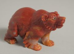 A RUSSIAN CARVED AGATE BEAR in a Faberge box. 3ins long.