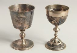 TWO SILVER WINE GOBLETS Both engraved.