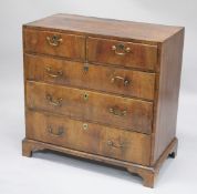 AN 18TH CENTURY WALNUT CHEST OF DRAWERS with a plain 
