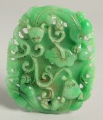 A LARGE CARVED JADE PENDANT. 4ins