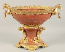 A GOOD GILT BRONZE AND RED MARBLE OVAL PEDESTAL BOWL 11ins high