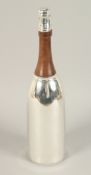 A CHAMPAGNE BOTTLE COCKTAIL SHAKER.