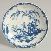 AN EARLY 18TH CENTURY LOWESTOFT SAUCER painted with a Boy on a Tightrope.