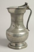 A GOOD 18TH CENTURY SWISS PEWTER FLAGON AND COVER 10ins high.