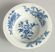 AN 18TH CENTURY WORCESTER PATTY PAN painted with the Early Flowering Plants pattern.