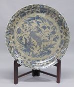 A VERY LARGE CHINESE BLUE AND WHITE DISH. 3ft diameter.