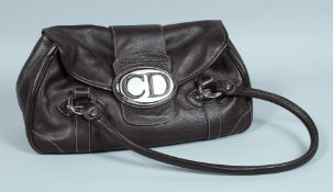 A CHRISTIAN DIOR LEATHER BAG. 11ins long.