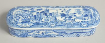 A BLUE AND WHITE POTTERY BOX AND COVER. 6.5ins long.