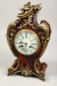 A GOOD 19TH CENTURY FRENCH TORTOISESHELL CLOCK by MAPLE & CO. PARIS. No. 2565. 14ins long.