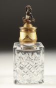 A RUSSIAN SILVER CUT GLASS SCENT BOTTLE AND STOPPER with silver gilt and enamel, and carved stopper,