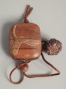 A WOODEN DRAGONFLY INRO with rope. 2.5ins.