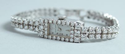 A GOOD LADIES HEIRLOOM DIAMOND SET COCKTAIL WATCH.