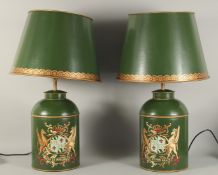 A PAIR OF GREEN TOLEWARE LAMPS AND SHADES 14ins high.
