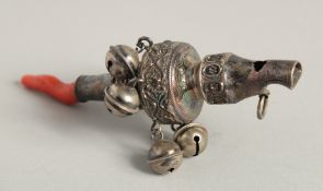 A BABY'S VICTORIAN SILVER AND CORAL TEETHING WHISTLE AND BELL.
