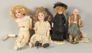 FOUR VICTORIAN DOLLS