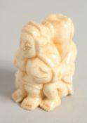 A CARVED BONE NETSUKE. 1.5ins.