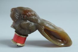 A SUPERB RUSSIAN SILVER AND HARDSTONE RABBIT HANDLE, with enamel and ruby eyes. 14cm long, 7cm
