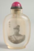 A CHINESE SNUFF BOTTLE with a portrait and calligraphy. 9cm high.
