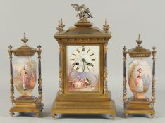 A GOOD THREE PIECE FRENCH CLOCK SET with painted porcelain panels. Clock 14ins high, side piece 9.