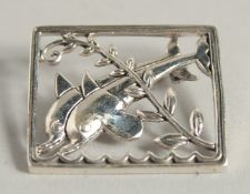 A DANISH STERLING SILVER DOUBLE DOLPHIN BROOCH.
