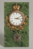 A FABERGE SILVER, JADE, AND DIAMOND CLOCK with bead work in a Faberge case. 4.25ins x 2.5ins. Mark S