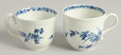 TWO 18TH CENTURY WORCESTER TWO FEATHER MOULDED COFFEE CUPS, one with a rare, shaped handle and