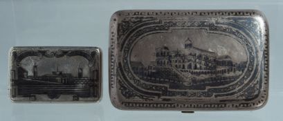 A RUSSIAN SILVER AND NIELLO CIGARETTE BOX. 9.5cm long and another 5.5cm long (2).
