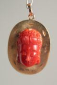 A 14CT GOLD AND CORAL BROOCH AND PENDANT.