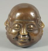A SMALL CHINESE BRONZE FOUR FACES BUDDHA. 4.5ins high