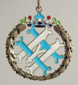 A RUSSIAN SILVER AND ENAMEL LAUREL LEAF BROOCH.