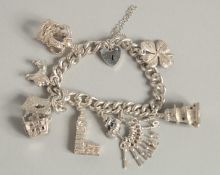 A SILVER CHARM BRACELET.