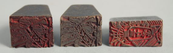 THREE SMALL CHINESE BRONZE SEALS. 2cm x 1.5cm