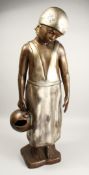 A LARGE BRONZE NATIVE GIRL carrying a bucket. 40ins high.