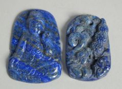 TWO CARVED LAPIS PENDANTS, a dragon and deity. 4.5cm