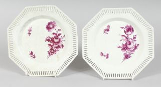A GOOD PAIR OF PIERCED OCTAGONAL BERLIN PLATES, flowers in sepia. Sceptre mark, 8ins diameter.