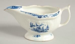 AN 18TH CENTURY LOWESTOFT FINE CREAM BOAT with pleat moulded body and moulded cartouches painted