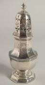 A GEORGE I OCTAGONAL SUGAR CASTOR by MATTHEW LONGMOOR. 6.5ins high. London 1714.