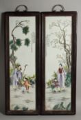 A PAIR OF MAHOGANY FRAMED CHINESE PORCELAIN PLAQUES. 28ins long x 8ins wide