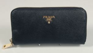 A PRADA BLACK LEATHER PURSE 7ins x 3.5ins.